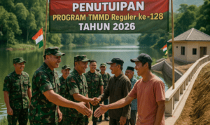 alt_text: TMMD Reguler ke-128 berfokus pada pembangunan infrastruktur di Desa Mekarmulya.