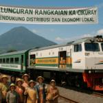 alt_text: KA Cikuray bergerak di jalur baru yang menghubungkan Stasiun Garut dengan Pasar Garut.